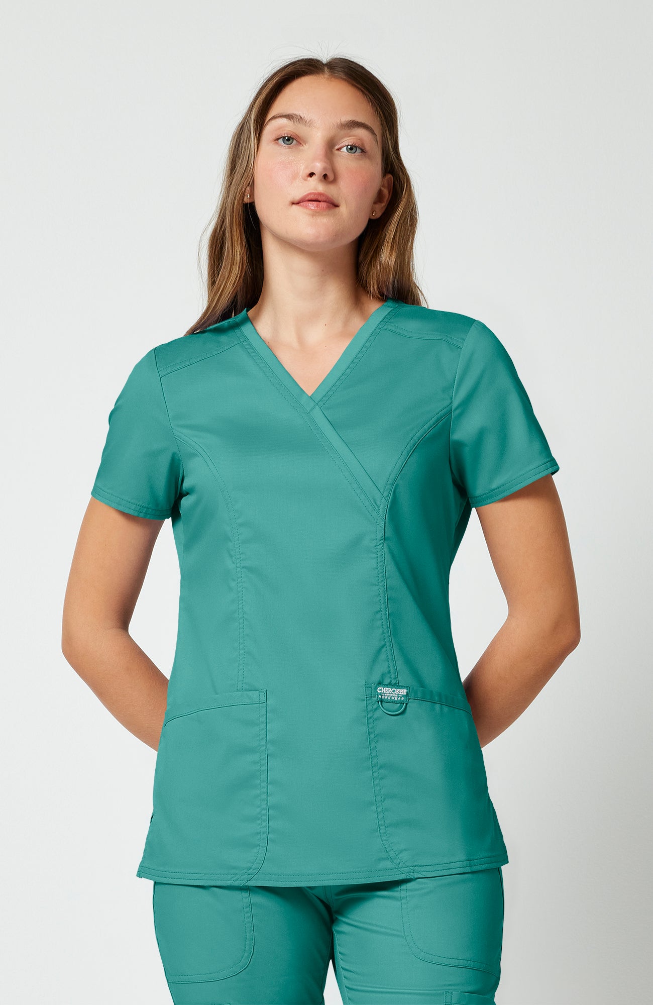 Cherokee WW Revolution Women's Shaped 3-Pocket Mock Wrap Scrub Top