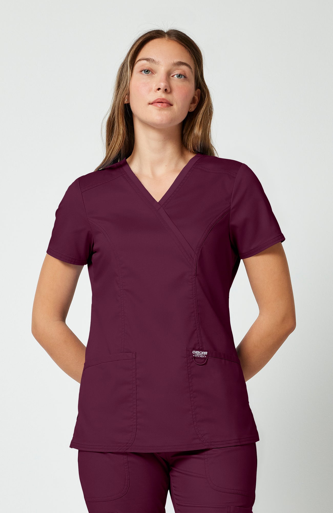 Cherokee WW Revolution Women's Shaped 3-Pocket Mock Wrap Scrub Top
